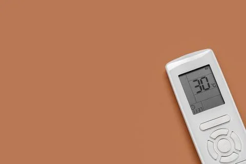 Air conditioner remote control on brown background Stock Photos