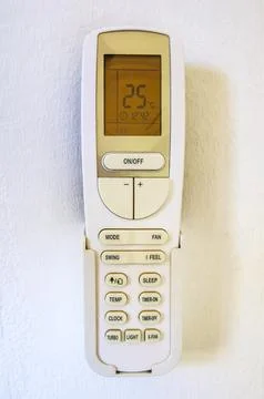 Air Conditioner Remote Control In Wall Holder Ready For Use Thai Hotel Thai.. Stock-Fotos