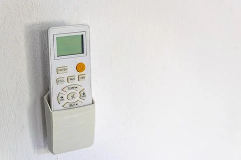 Air Conditioner Remote Control In Wall Holder Ready For Use Thai Hotel Thai.. Stock-Fotos