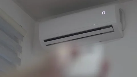 Air Conditioner Runs and Cools the Room Stock Footage 233858204