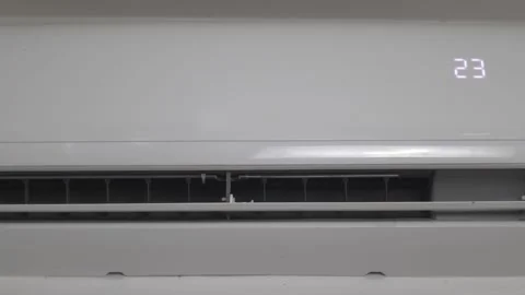 Air Conditioner Runs and Cools the Room Stock Footage 233858207