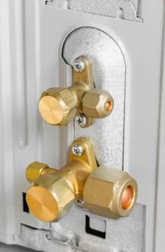 Air conditioner service and shut off valve Stock Photos