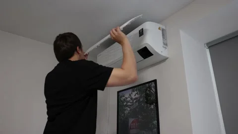 Air Conditioner Service Putting Filter On. AC Cleaning Service Maintenance Video stock 202082128