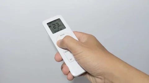 Air conditioner setting with remote control 스톡 동영상 308611099