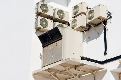 Air conditioner units in the wall Stock Photos
