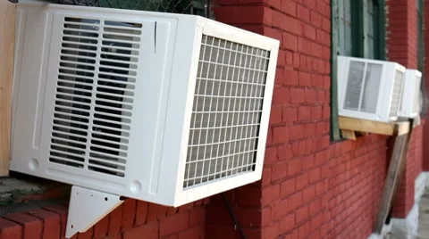 Air conditioners on side of building dripping Stock-Footage 8300843