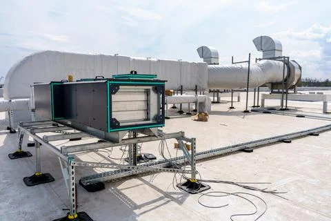 The air conditioning and ventilation system of industrial building on the roof Stock Photos
