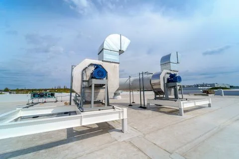 The air conditioning and ventilation system of industrial building on the roof Stock Photos