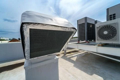 The air conditioning and ventilation system of industrial building on the roof Stock Photos