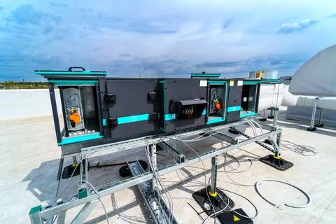 The air conditioning and ventilation system of industrial building on the roof Stock Photos