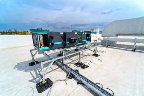 The air conditioning and ventilation system of industrial building on the roof Stock Photos