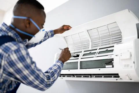 Air Conditioning Checking And Filter Cleaning Stock Photos