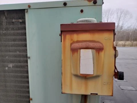Air Conditioning Condensing Unit Rusty Disconnect box Stock Photos