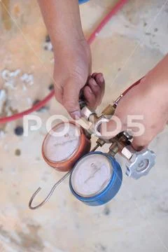 Air conditioning servicing Stock Photos