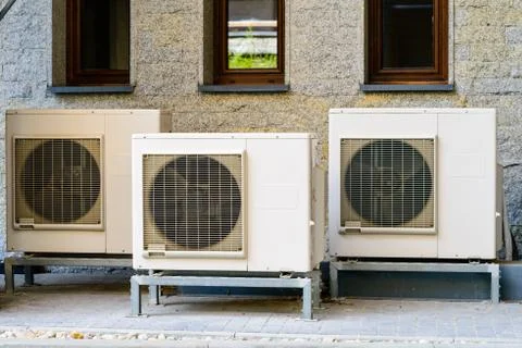 Air conditioning system assembled on side of a building Stock Photos