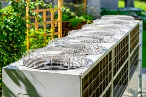 Air conditioning system assembled on side of a building 스톡 사진