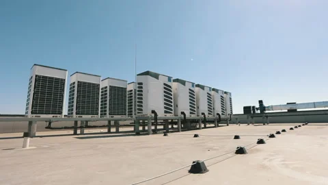 An air conditioning system of two rows of air conditioners is located on the Stock Footage 168358640