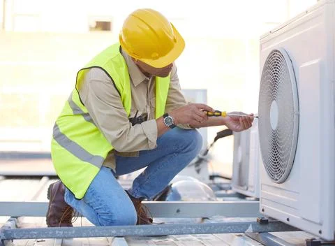 Air conditioning, technician or engineer on roof for maintenance, building or Fotos de archivo