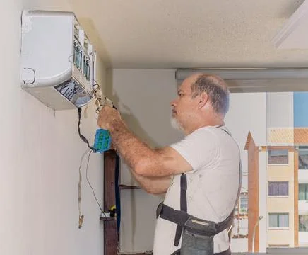 Air conditioning technician Stock Photos