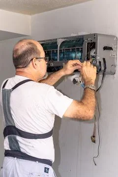 Air conditioning technician Stock Photos