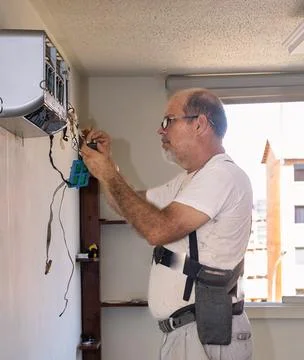 Air conditioning technician Stock Photos