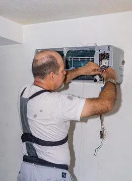 Air conditioning technician Stock Photos