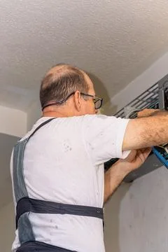 Air conditioning technician Stock Photos