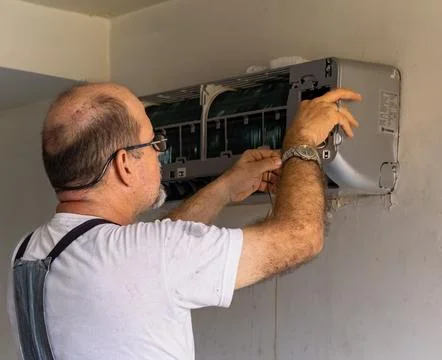 Air conditioning technician Stock Photos