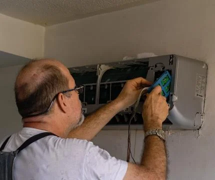 Air conditioning technician Stock Photos