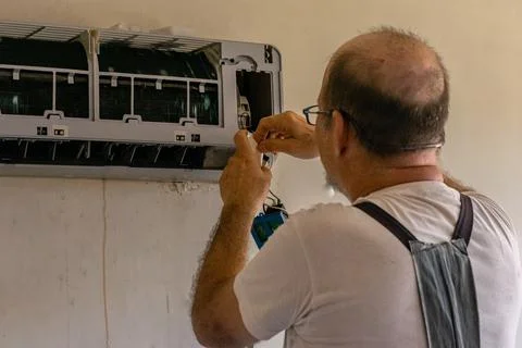 Air conditioning technician Stock Photos