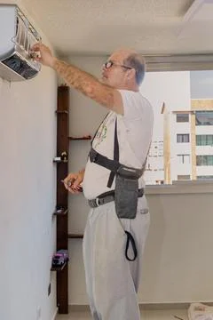 Air conditioning technician Stock Photos