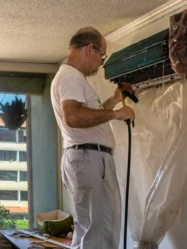 Air conditioning technician Stock Photos