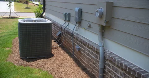 Air Conditioning Unit and Electric Meter Rise Side of Home 스톡 동영상 64816319