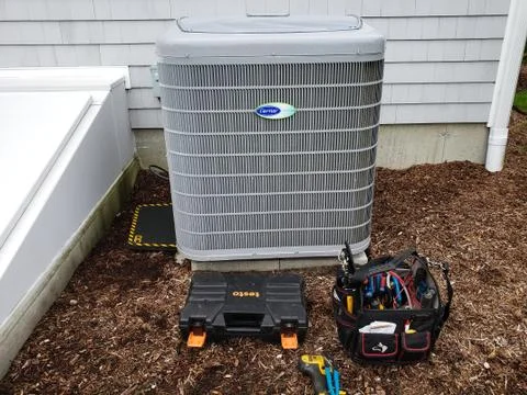 Air conditioning unit being charged with R410a refrigerant. Stock Photos