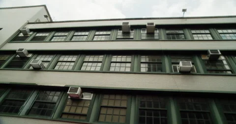 Air conditioning units in the windows of a school Stock Footage 158762266