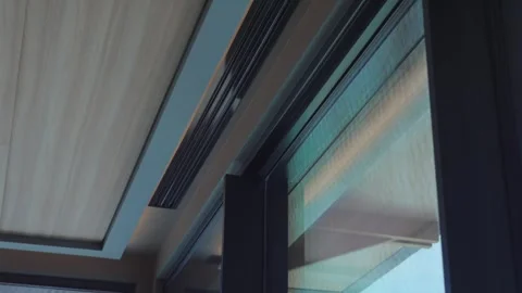 An air conditioning vents in a ceiling front of the window Stock Footage 306436411