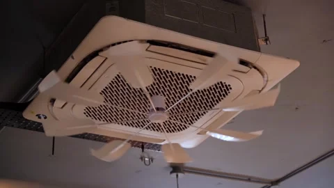 An air conditioning wind deflector installed on the air conditioning. Stockbeeldmateriaal 301941851