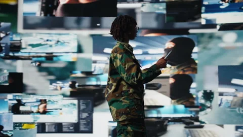 Air defense commander using radar systems on tablet app Stock Footage 318934340