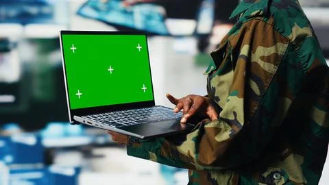 Air defense commander using radar systems on green screen mockup laptop Stock Photos