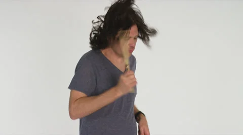 Air-Drumming Man, White Background Stock Footage 35230197