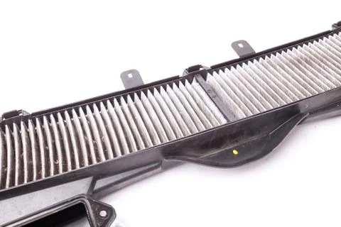 Air filter on black panel for heating or cooling air in the passenger compart Stock Photos