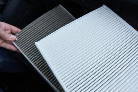 Air filter in the car close-up. Selective focus. Stock Photos