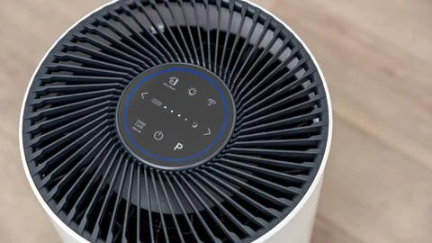 Air filter device with sleek design and control panel, showcasing modern Foto stock