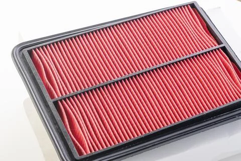 Air filter for internal combustion engine close-up. Paper air filter of car.. Stock Photos