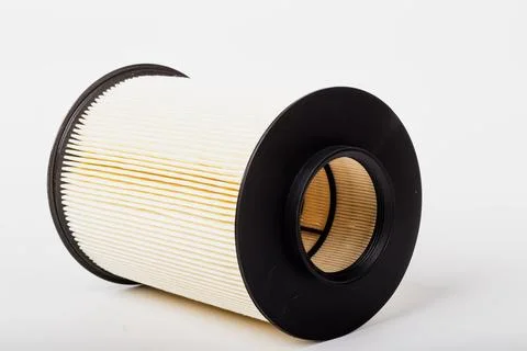 Air filter made of paper. The filter element is used in a car. Close-up. 스톡 사진