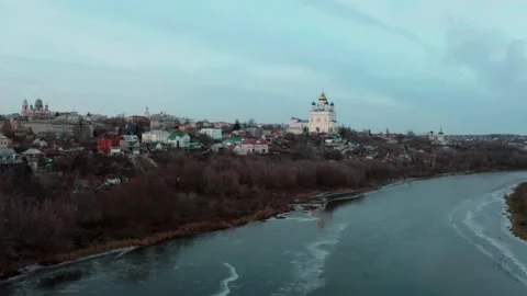 Air flight over the track in the background of the church Stock Footage 194453941