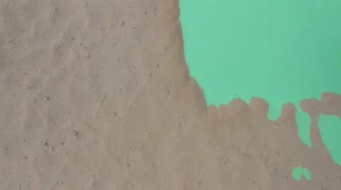 Air flow blows the sand and opens Stock Footage 68894942