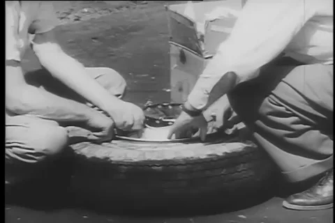 Air force engineers install parachute into droppable wheels - 1956 Stock Footage 99085494