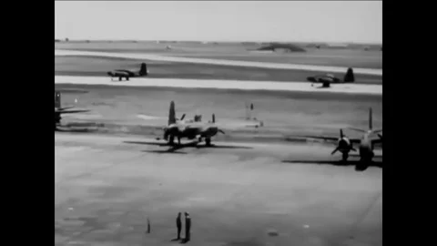 An Air Force general talks to a young pilot about his responsibility with a Stock Footage