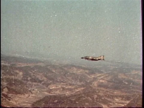 An air force jet pilot experiences an emergency and must eject. Stock Footage 75315055
